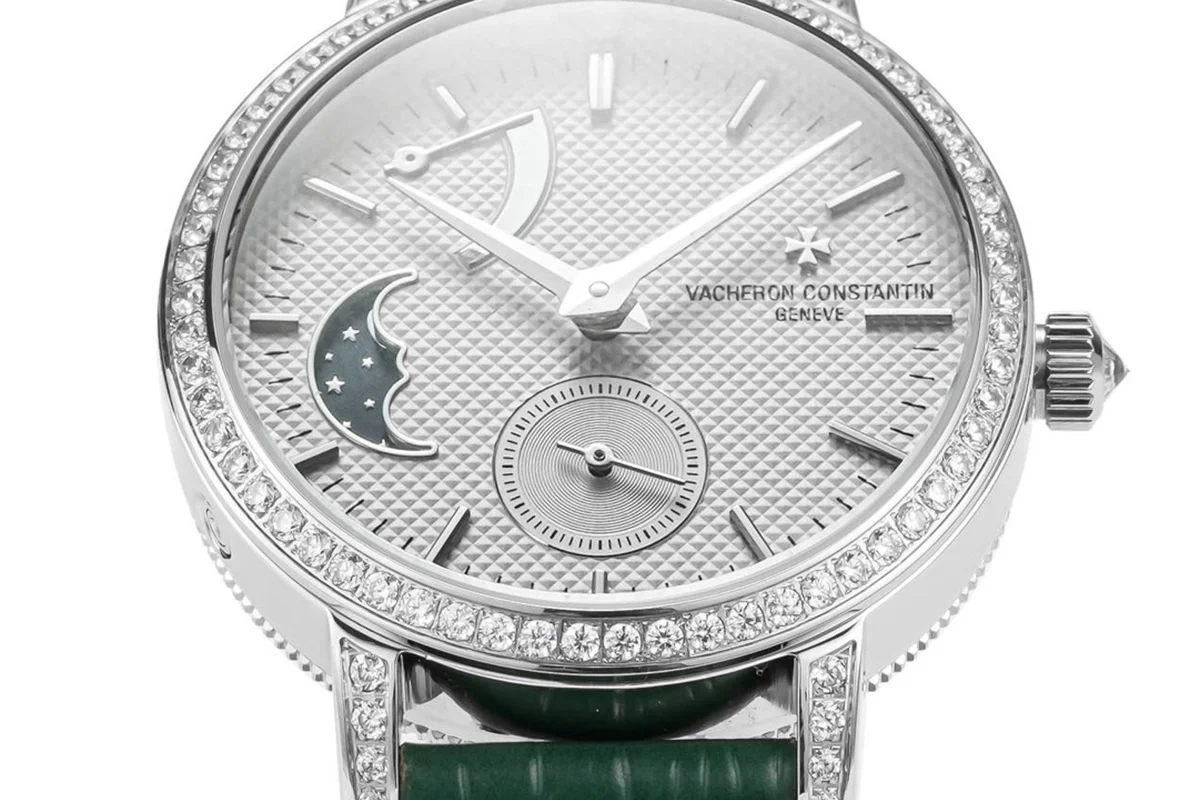 Traditionelle Moon Phase White Dial with Diamond Bezel in White Gold on Green Leather Strap